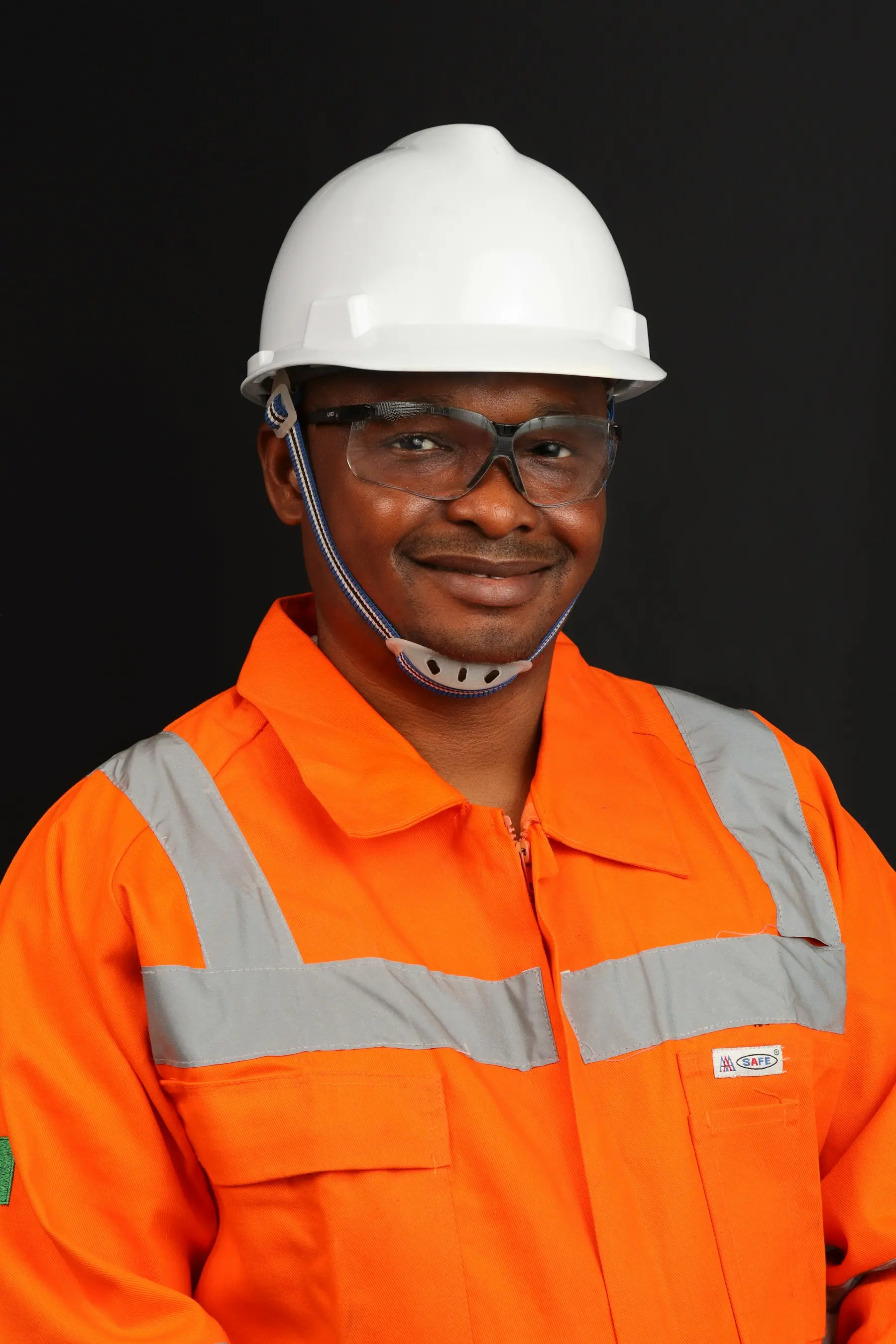 Site engineer in a hard hat and high-visibility jacket
