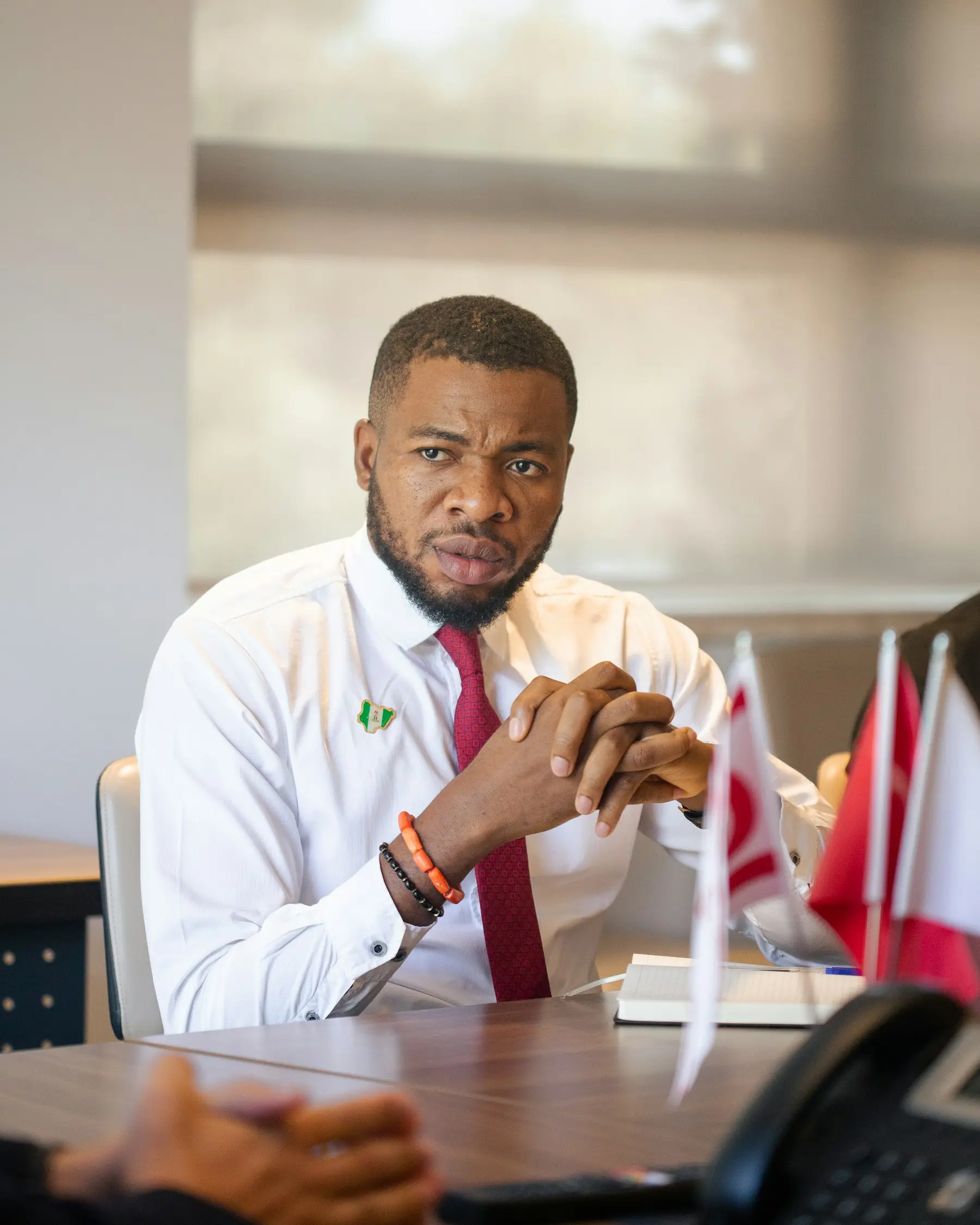 Lawyer in a shirt and tie at his desk